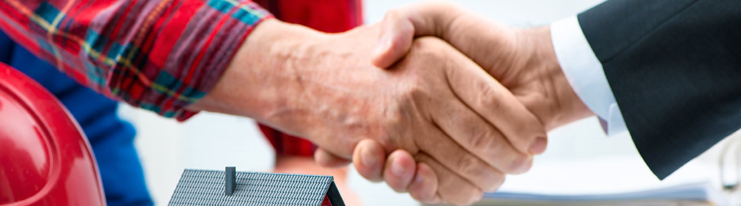 Two men shaking hands.